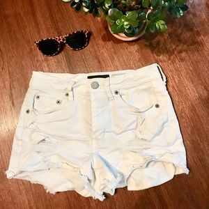 Ladies white denim, distressed “shorty” shorts